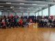 Die Teilnehmerinnen und Teilnehmer des internationalen Sparringslehrgangs 2026 in Heidelberg auf einem Gruppenbild vor den Boxringen.